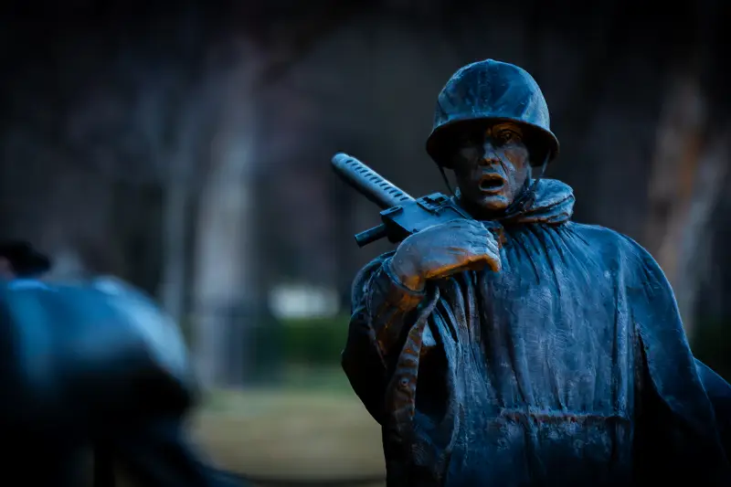 Bronze soldier statue at a war memorial